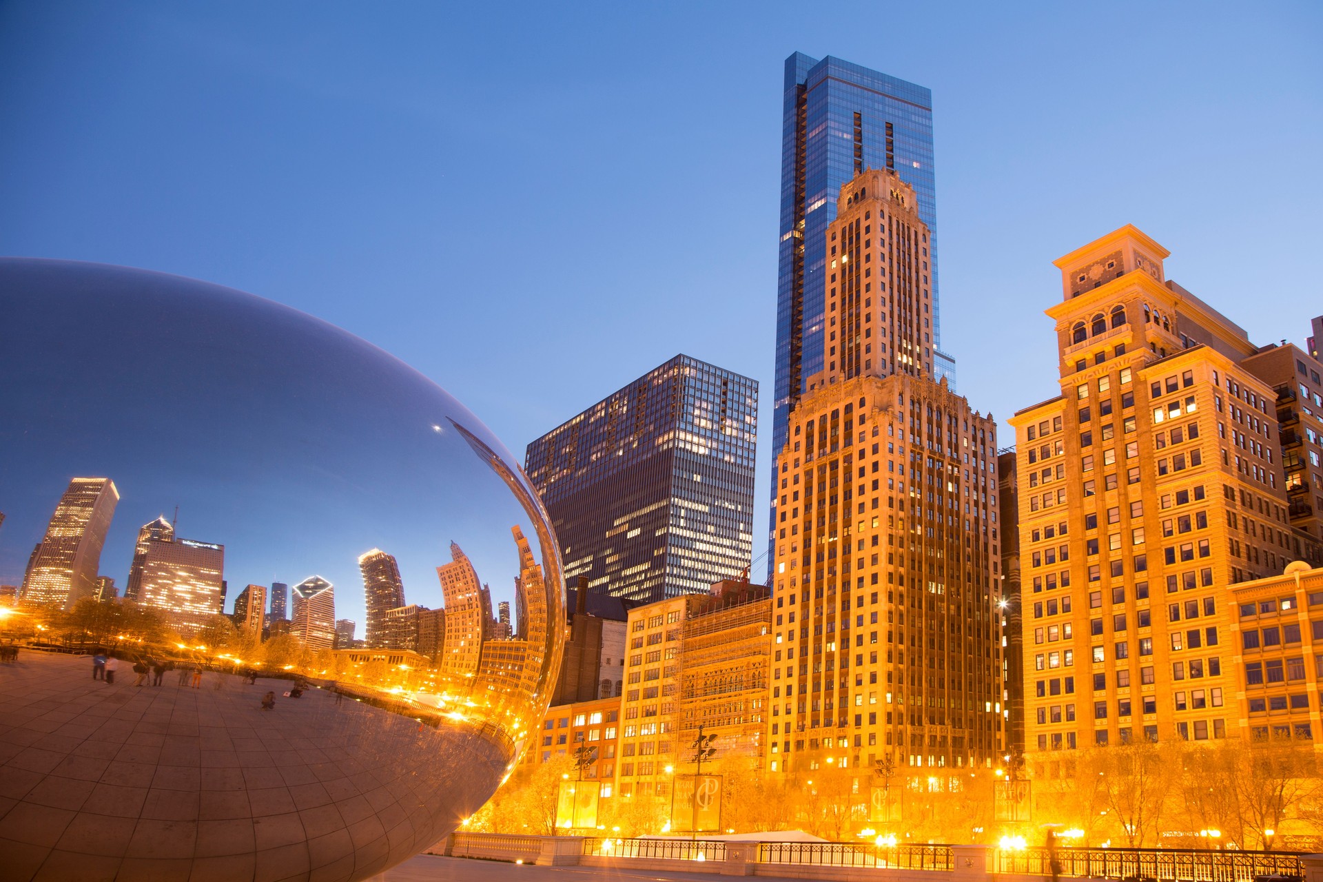 City skyline and reflection in mirror at sunset